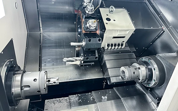 Dual-spindle configuration of a CNC turning center
