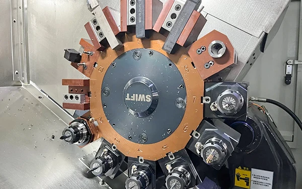 Power turret and driven-tool stations in a CNC turning center